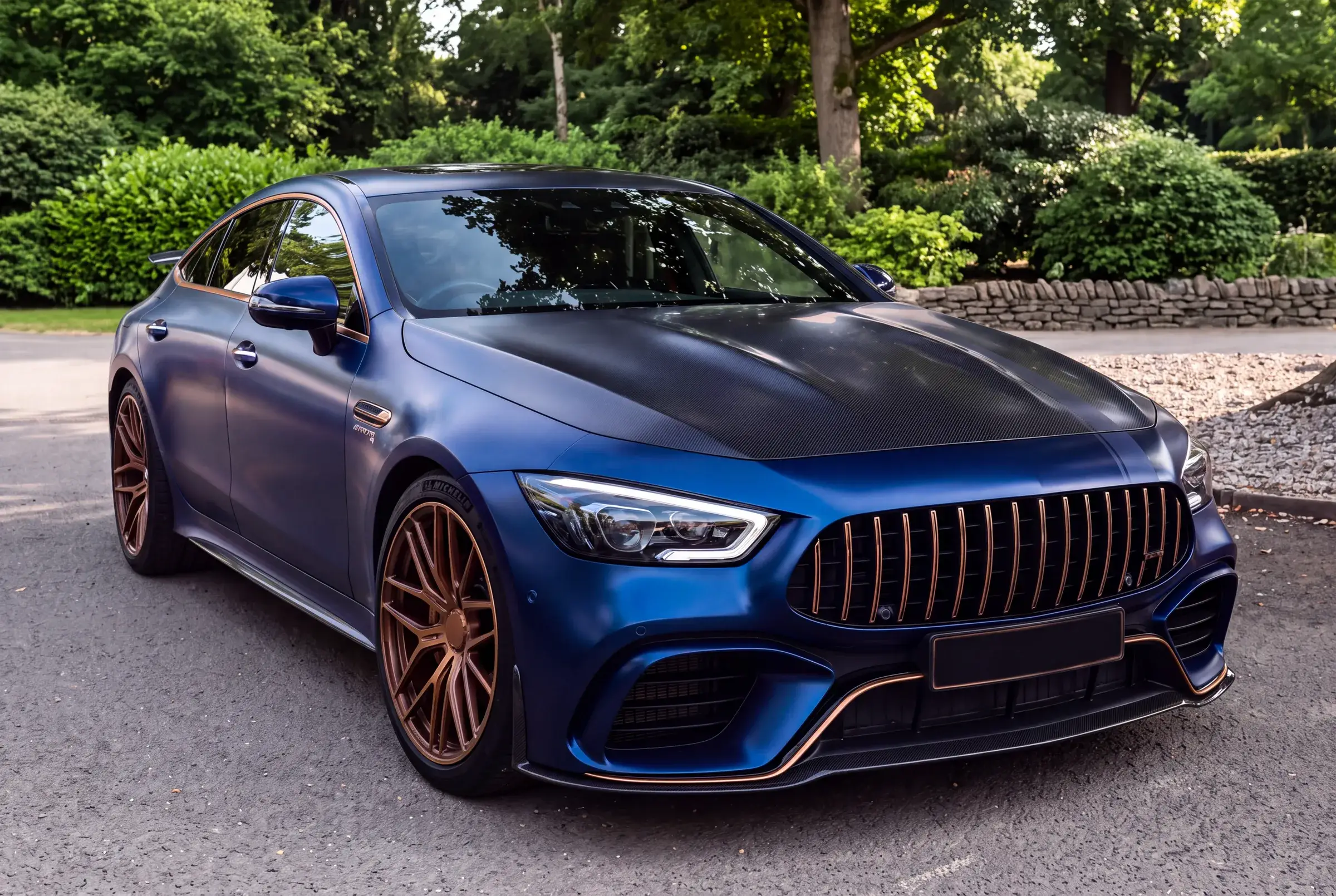 Matte blue AMG GT 63 with copper wheels