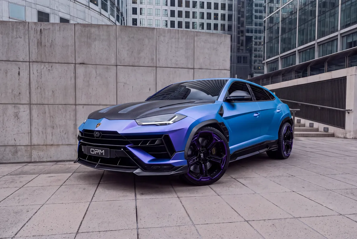 Blue Urus and purple Huracán on a concrete plaza