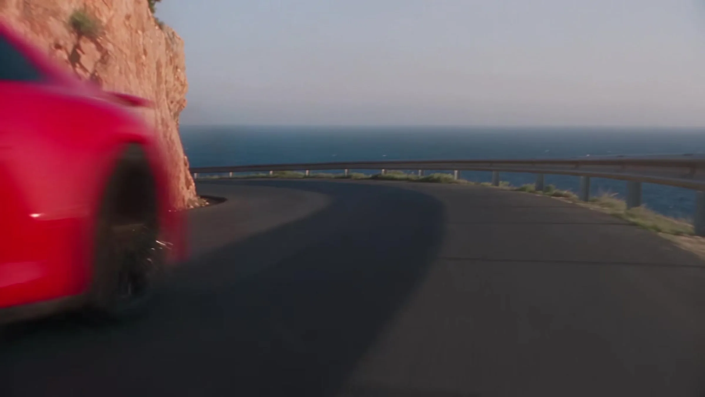 The Turbo S head-on, coastal road
